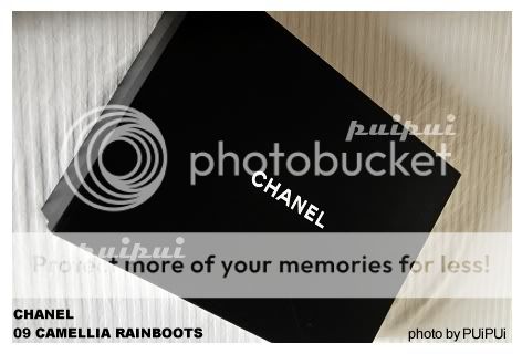 .....CHANEL.....09 CAMELLIA rain boots ..Black color...