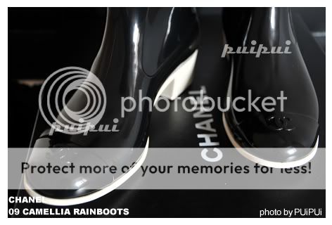 .....CHANEL.....09 CAMELLIA rain boots ..Black color...