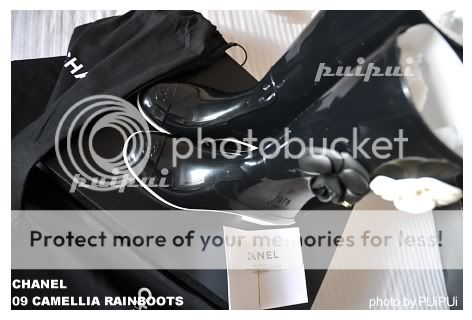.....CHANEL.....09 CAMELLIA rain boots ..Black color...