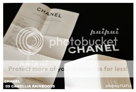 .....CHANEL.....09 CAMELLIA rain boots ..Black color...